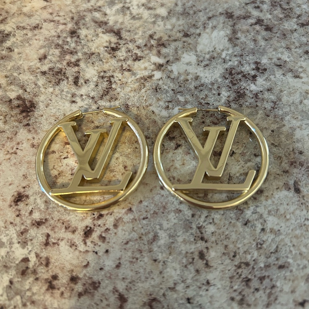 Beautiful LV gold earrings great for any and every day wear